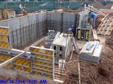 Placing Rebar at wall forms at M 5-6 Facing South-East (800x600).jpg